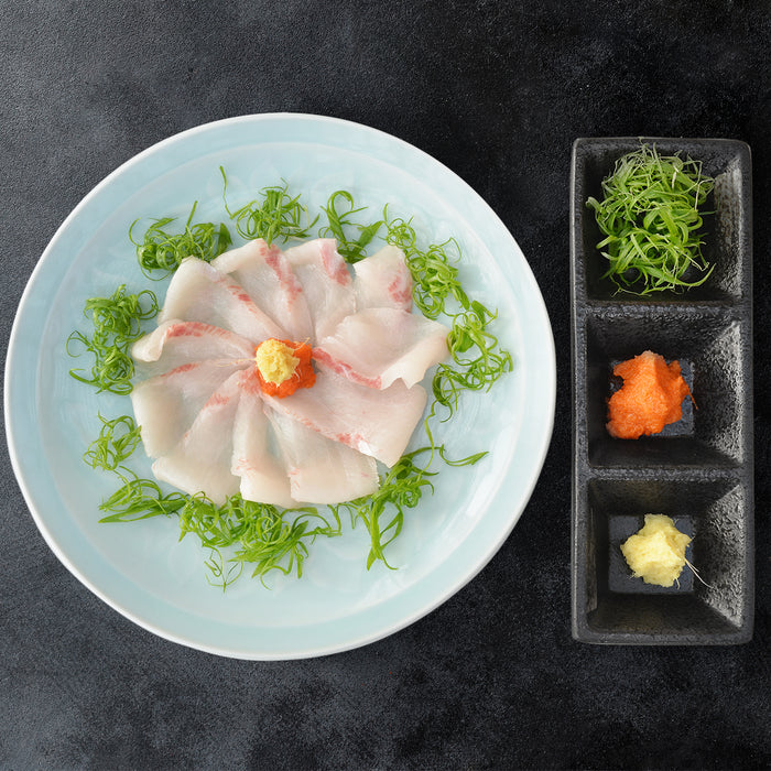 a plate of Australian Cobia Black Kingfish